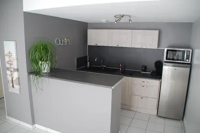 Cuisine ou kitchenette dans l'établissement Comme à la maison