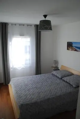 Un ou plusieurs lits dans un hébergement de l'établissement Comme à la maison