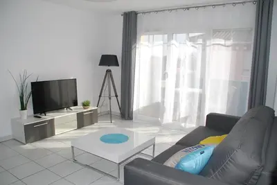 Télévision ou salle de divertissement dans l'établissement Comme à la maison