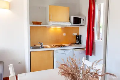 Cuisine ou kitchenette dans l'établissement Olydea la Chalosse - Cassen