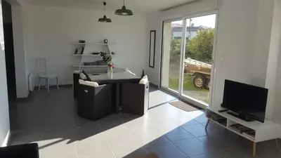 Télévision ou salle de divertissement dans l'établissement villa l atlantide