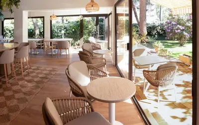Coin salon dans l'établissement Résidence Hôtelière les Acanthes