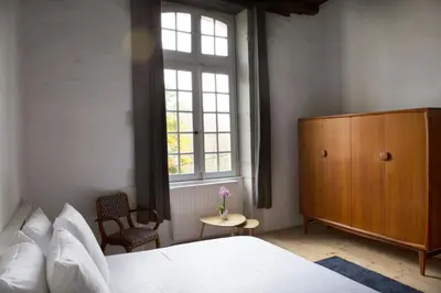 Un ou plusieurs lits dans un hébergement de l'établissement Chateau Saint Martin B&B