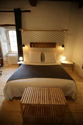 Un ou plusieurs lits dans un hébergement de l'établissement Chateau Saint Martin B&B