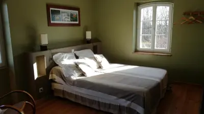 Un ou plusieurs lits dans un hébergement de l'établissement Cottage Narbay
