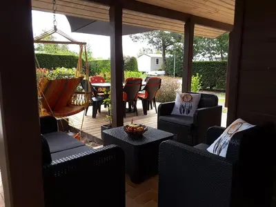 Coin salon dans l'établissement Chalet Camping Les Vignes