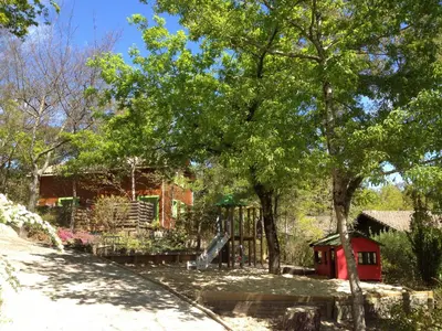 Jardin de l'établissement Village Nature et Océan à côté de la plage avec piscine et jacuzzi