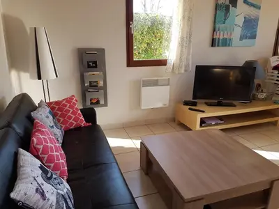 Télévision ou salle de divertissement dans l'établissement Village Océlandes