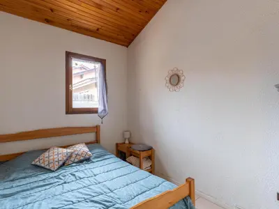 Un ou plusieurs lits dans un hébergement de l'établissement Maison Mitoyenne à 200m de la Plage avec Parking - FR-1-319-186