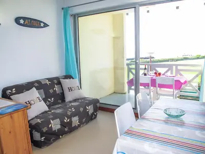Coin salon dans l'établissement Apartment Grand Pavois-5 by Interhome