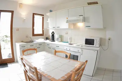 Cuisine ou kitchenette dans l'établissement Les Coquillages