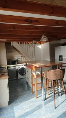 Cuisine ou kitchenette dans l'établissement Maison ocelandes