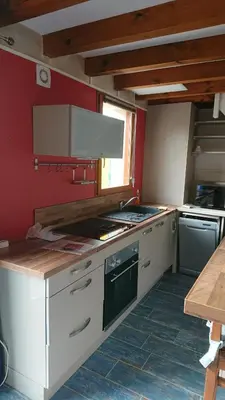Cuisine ou kitchenette dans l'établissement Maison ocelandes