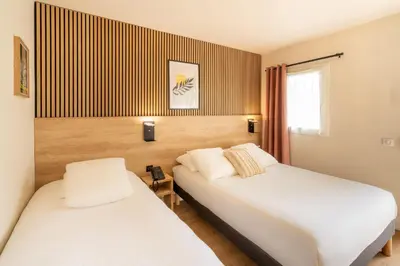 Un ou plusieurs lits dans un hébergement de l'établissement Sure Hotel by Best Western Mont-de-Marsan