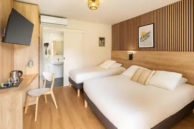 Un ou plusieurs lits dans un hébergement de l'établissement Sure Hotel by Best Western Mont-de-Marsan