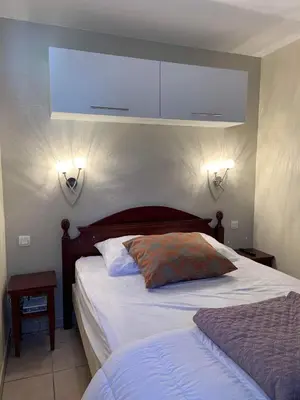 Un ou plusieurs lits dans un hébergement de l'établissement Appartement a loué domaine de gasgogne a biscarrosse
