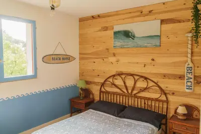 Un ou plusieurs lits dans un hébergement de l'établissement Roofless Surf Lodge