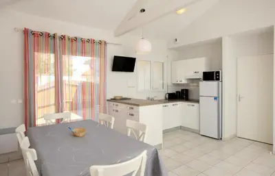 Cuisine ou kitchenette dans l'établissement Residence Plage Oceane