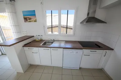 Cuisine ou kitchenette dans l'établissement Residence Plage Oceane