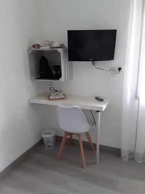 Télévision ou salle de divertissement dans l'établissement Chambre d'hôtes les Iris à Mios sur le Bassin d'Arcachon