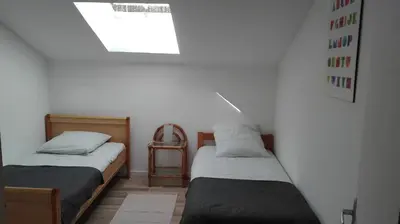 Un ou plusieurs lits dans un hébergement de l'établissement Maison moderne proche lac et plage