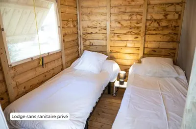Un ou plusieurs lits dans un hébergement de l'établissement Camping Routes du Monde ATC La Hume-Arcachon