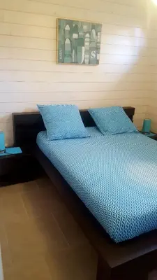 Un ou plusieurs lits dans un hébergement de l'établissement Maison tout confort 6 personnes à 300m de la plage - Clim & Wifi