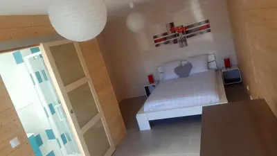 Un ou plusieurs lits dans un hébergement de l'établissement Maison tout confort 6 personnes à 300m de la plage - Clim & Wifi