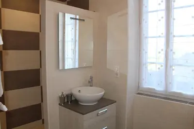 Salle de bains dans l'établissement Les Chambres d'Eugénie