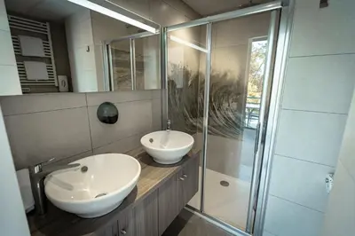Salle de bains dans l'établissement Hotel Mercedes