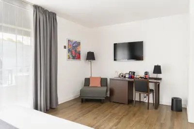 Télévision ou salle de divertissement dans l'établissement Hype Hôtel