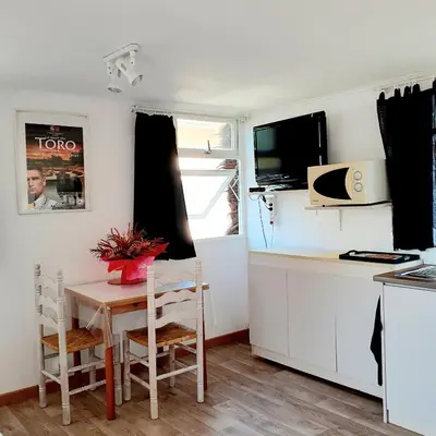 Cuisine ou kitchenette dans l'établissement Chalet