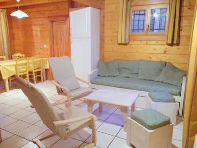 Coin salon dans l'établissement Chalet Elocances