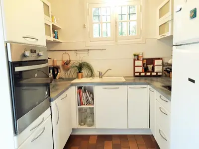 Cuisine ou kitchenette dans l'établissement XAVIER 62 Maison Familiale 4 Chambres au Calme