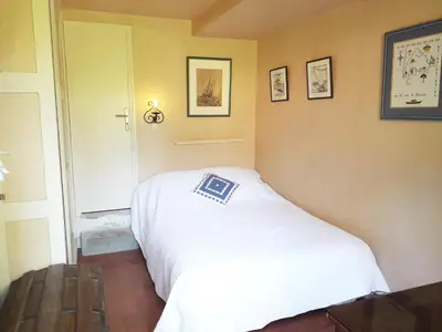Un ou plusieurs lits dans un hébergement de l'établissement XAVIER 62 Maison Familiale 4 Chambres au Calme