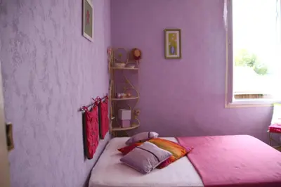 Un ou plusieurs lits dans un hébergement de l'établissement Grande maison de vacances