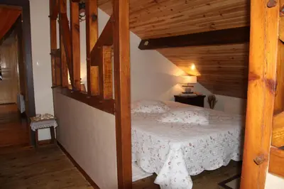 Un ou plusieurs lits dans un hébergement de l'établissement Grande maison de vacances