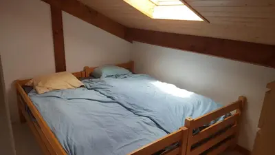 Un ou plusieurs lits dans un hébergement de l'établissement Village Océlandes 187