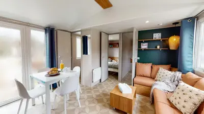 Coin salon dans l'établissement Camping Officiel Siblu La Réserve
