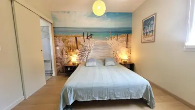 Un ou plusieurs lits dans un hébergement de l'établissement VILLA CASA KOKO 10 PERS piscine chauffée, pétanque, ping pong VIEUX-BOUCAU
