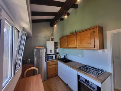 Cuisine ou kitchenette dans l'établissement Appartement duplex 5 personnes, vue sur la dune #0295