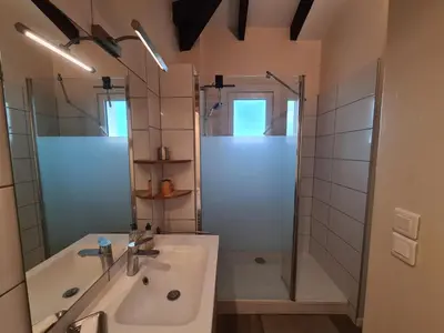 Salle de bains dans l'établissement Appartement duplex 5 personnes, vue sur la dune #0295