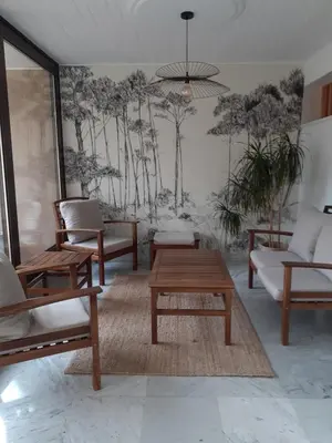 Coin salon dans l'établissement Studio cure avec accès direct Thermes