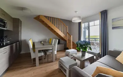 Coin salon dans l'établissement Lagrange Vacances Les Balcons de l'Océan
