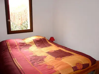Un ou plusieurs lits dans un hébergement de l'établissement Holiday Home Paradise Océan-5 by Interhome