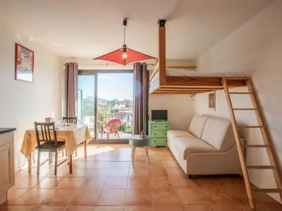 Coin salon dans l'établissement Apartment Le Grand Large by Interhome