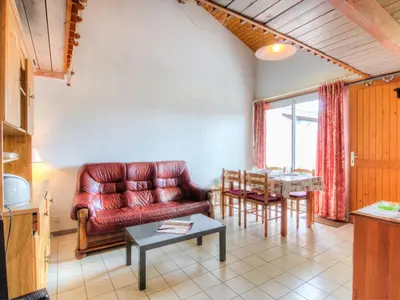 Coin salon dans l'établissement Apartment Le Gallia by Interhome