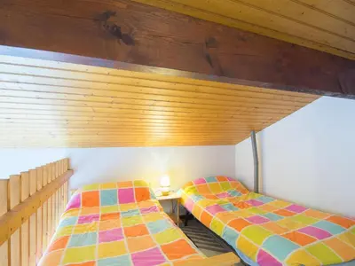 Un ou plusieurs lits dans un hébergement de l'établissement Apartment Le Gallia by Interhome