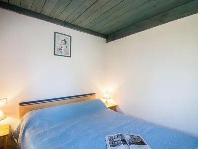 Un ou plusieurs lits dans un hébergement de l'établissement Apartment Le Gallia by Interhome