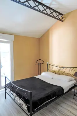 Un ou plusieurs lits dans un hébergement de l'établissement Holiday Home LA FORGE by Interhome